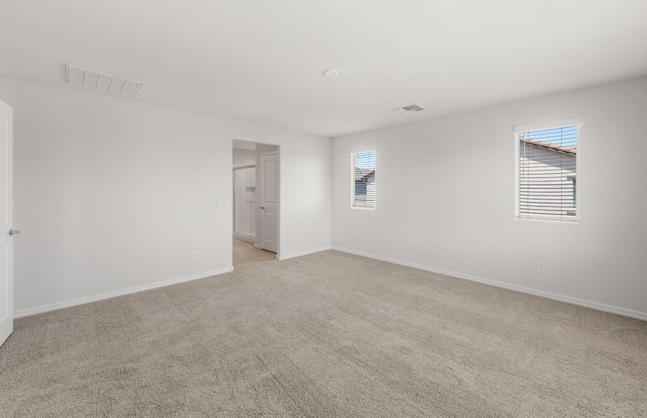 Spacious, unfurnished interior of a new home in Asante- Atrium Series, Surprise (Image 16).