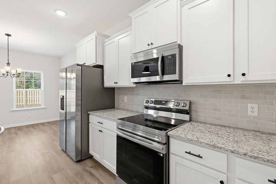 Representative furnished interior of a home built from the The Porter by RTS Homes in Grand Reserve, Hinesville (Image 8).