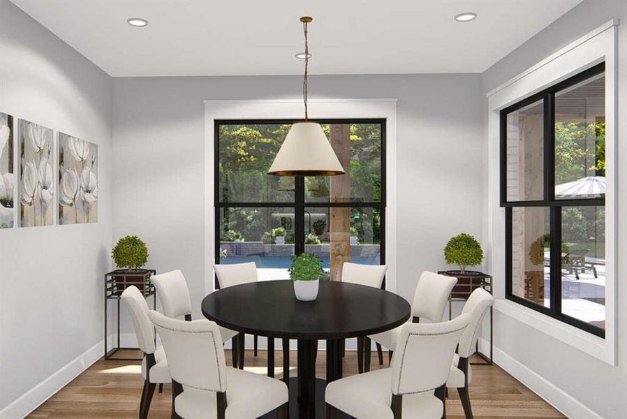 Dining space with recessed lighting and wood finished floors