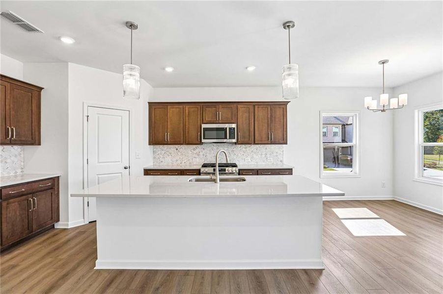 Furnished interior view inside a new home in Eastlyn Crossing, Flowery Branch (Image 11).