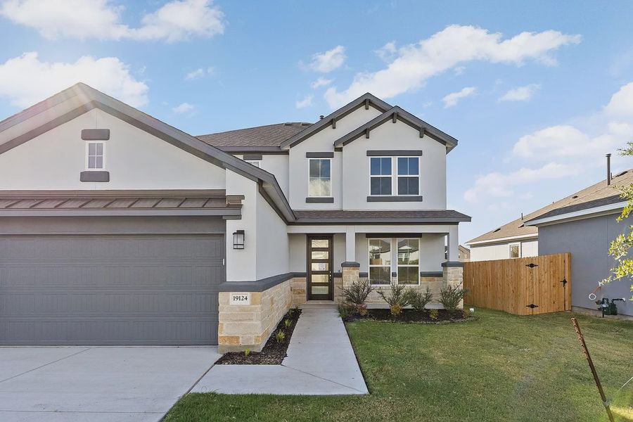 Front exterior of a new home in Enclave at Cele, Pflugerville, TX, highlighting curb appeal (Image 21).