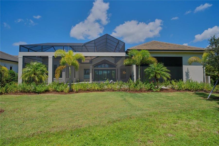 Front exterior of a new home in , Bradenton, FL, highlighting curb appeal (Image 23).