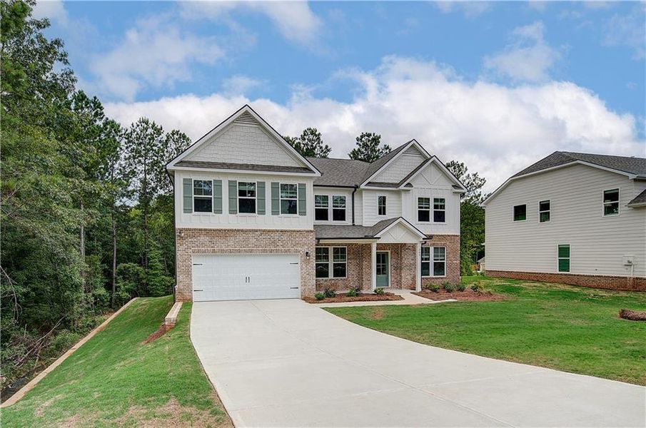 Front exterior of a new home in Kingston, Locust Grove, GA, highlighting curb appeal (Image 17). Front exterior of a new home in Kingston, Locust Grove, GA, highlighting curb appeal (Image 17).