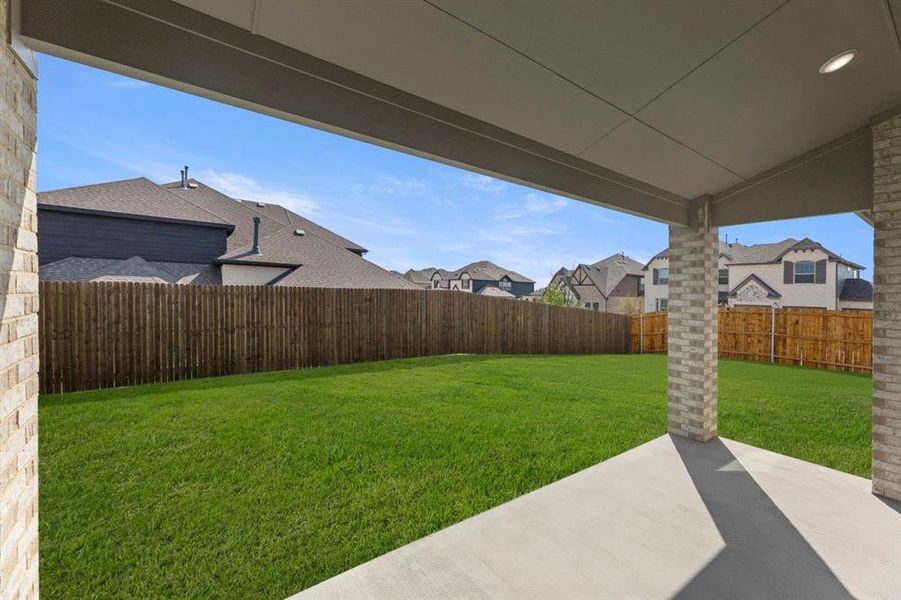 Exterior details and patio area of a home in Woodcreek, Rockwall (Image 19).