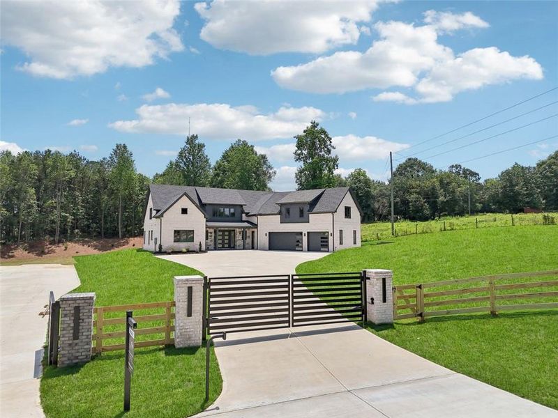 Front exterior of a new home in , Braselton, GA, highlighting curb appeal (Image 30). Front exterior of a new home in , Braselton, GA, highlighting curb appeal (Image 30).
