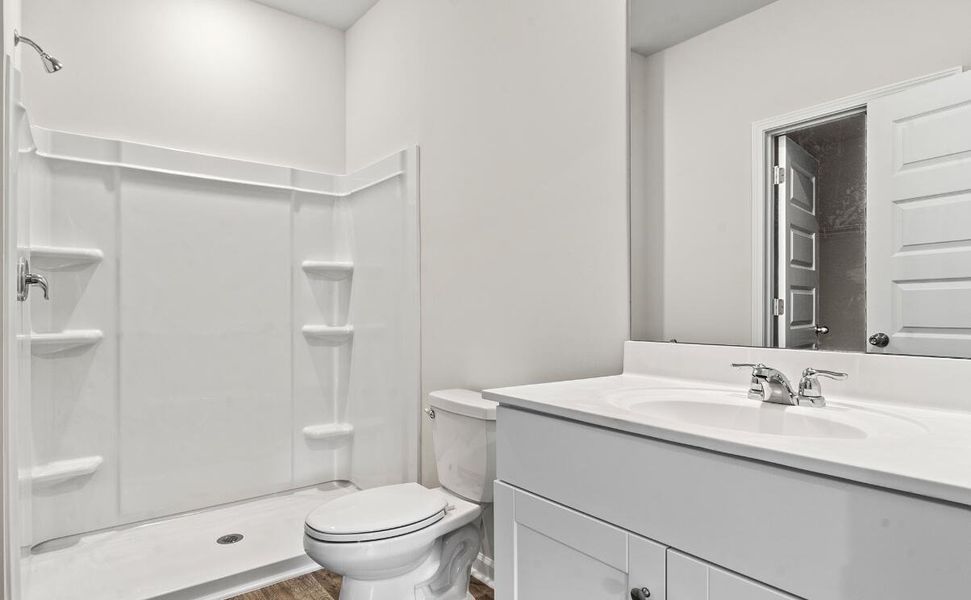 Furnished interior view inside a new home in Lindera Preserve at Cane Bay Plantation: American Dream Series - Ph 15, Summerville (Image 8). Furnished interior view inside a new home in Lindera Preserve at Cane Bay Plantation: American Dream Series - Ph 15, Summerville (Image 8).