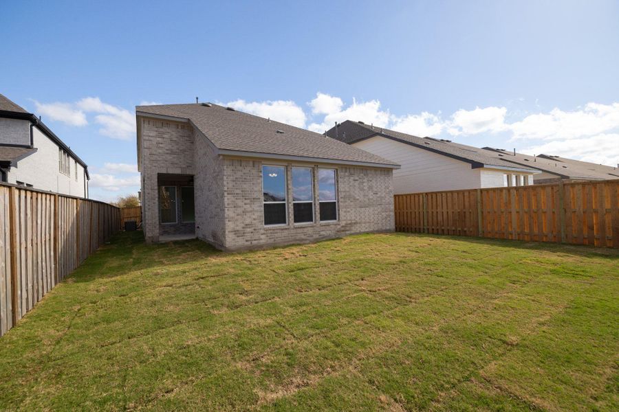 Exterior details and patio area of a home in Parmer Ranch, Georgetown (Image 3).