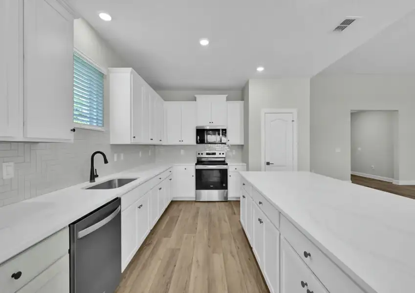 Each kitchen comes loaded with stainless steel appliances