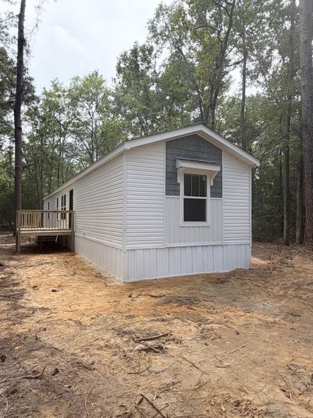 Exterior details and patio area of a home in , Round O (Image 10).