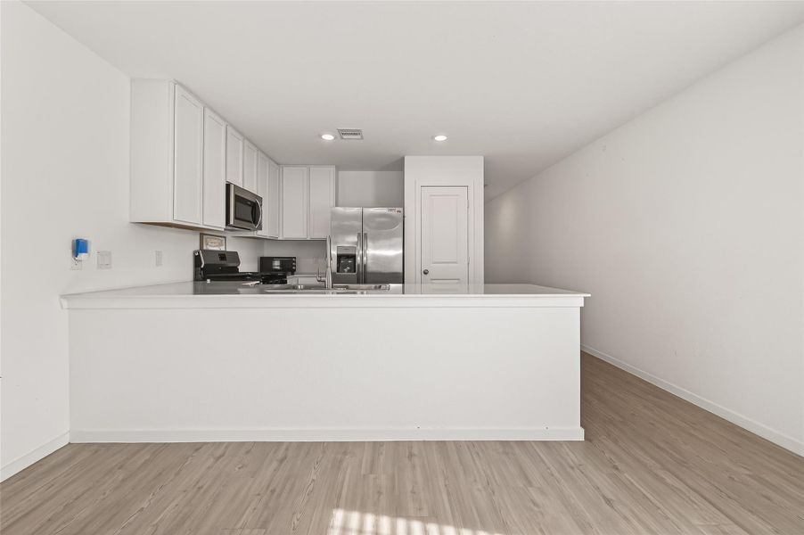 Furnished interior view inside a new home in Anniston, Katy (Image 12).