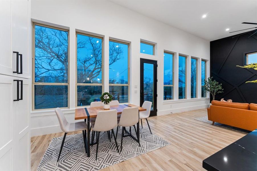 Spacious dining room area with lots of natural light.