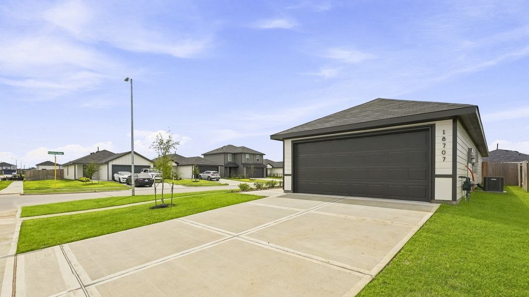 Front exterior of a new home in Sunset Valley, Hockley, TX, highlighting curb appeal (Image 20).