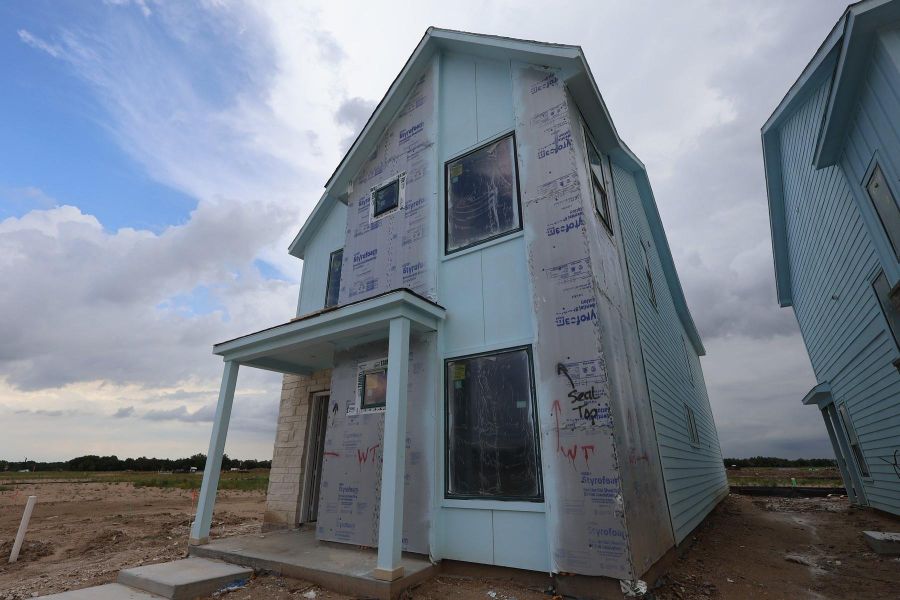 In-progress construction of a new home in Bridgeland Central: Emerald Heights - Cottages Row Collection, Cypress, TX (Image 11).