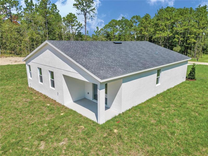 Front exterior of a new home in , Dunnellon, FL, highlighting curb appeal (Image 30).