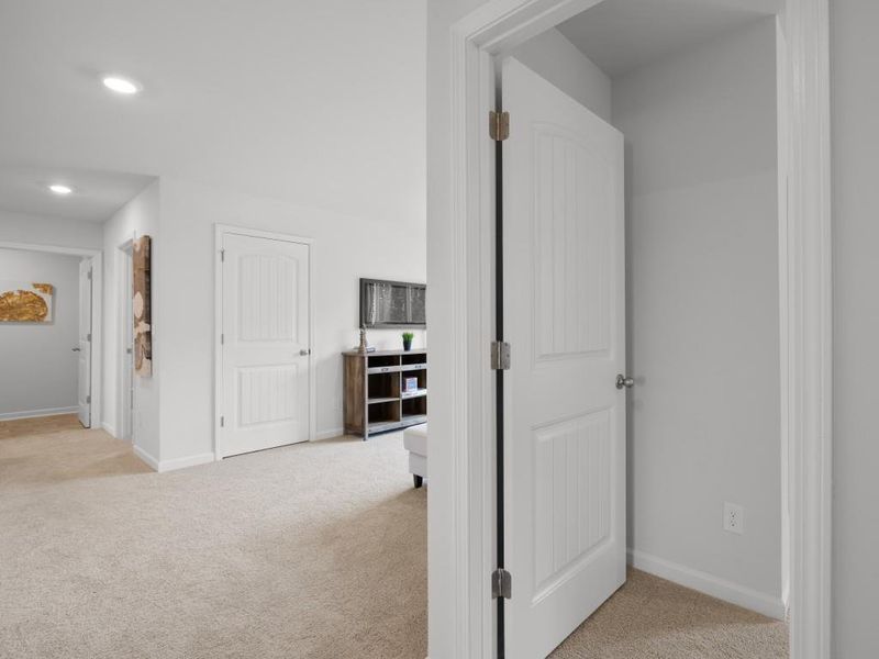 Furnished interior view inside a new home in Oaks at Cedar Grove, Fairburn (Image 42).