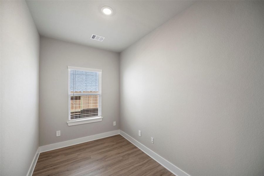 Versatile flex space that easily transforms into a playroom, craft room, or library.