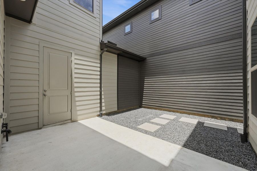Exterior details and patio area of a home in Two Step Farm, Montgomery (Image 3).