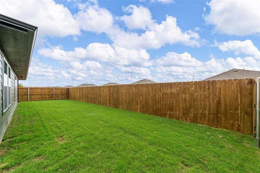 Front exterior of a new home in , Greenville, TX, highlighting curb appeal (Image 21). Front exterior of a new home in , Greenville, TX, highlighting curb appeal (Image 21).