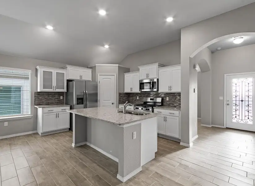 Representative furnished interior of a home built from the Mesilla 1747 SSC by Saratoga Homes in Crossland, El Paso (Image 3).