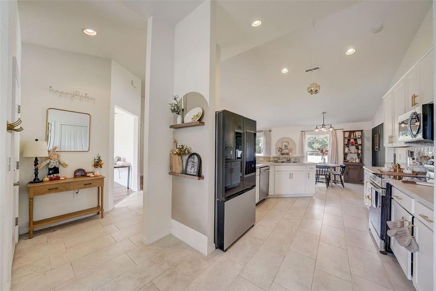 Furnished interior view inside a new home in The Grove At Crystal Beach, Winter Haven (Image 9). Furnished interior view inside a new home in The Grove At Crystal Beach, Winter Haven (Image 9).