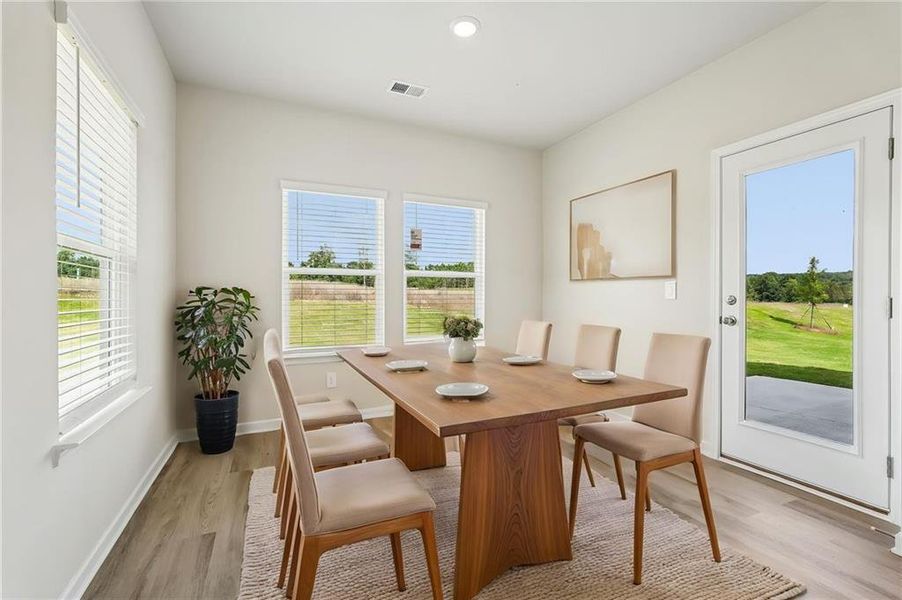 Furnished interior view inside a new home in Northwoods at Mirror Lake, Villa Rica (Image 5).