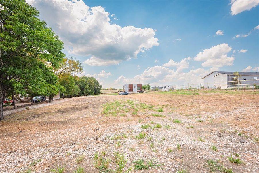 View of yard featuring a rural view View of yard featuring a rural view