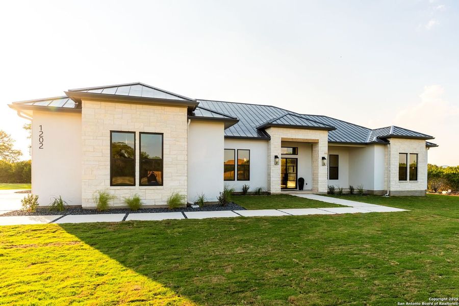 Exterior details and patio area of a home in , Bandera (Image 28).