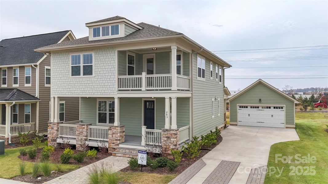 Front exterior of a new home in Riverwalk, Rock Hill, SC, highlighting curb appeal (Image 1).