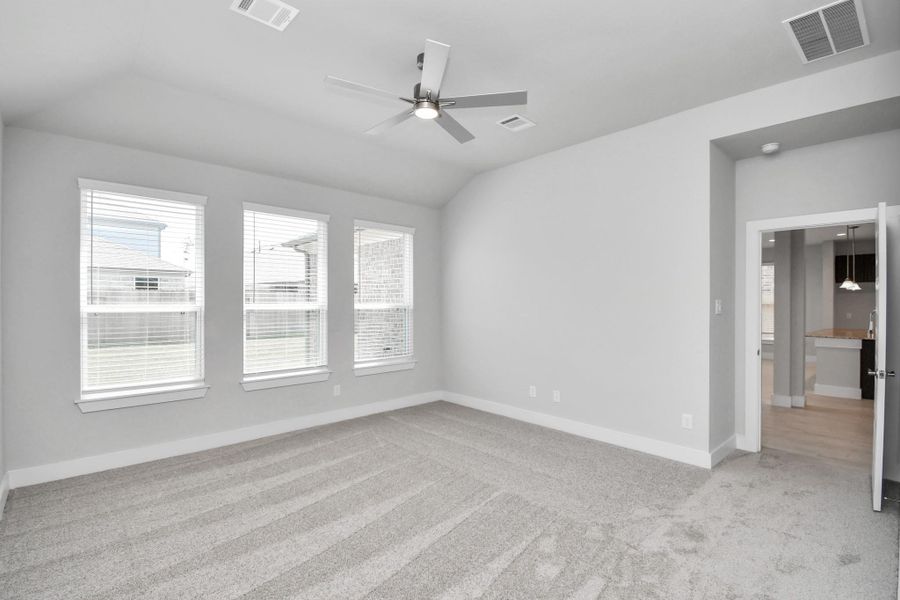 Come and unwind after a long day in this magnificent primary suite! This spacious room features plush carpet, warm paint, high ceilings and large windows with privacy blinds. Come and unwind after a long day in this magnificent primary suite! This spacious room features plush carpet, warm paint, high ceilings and large windows with privacy blinds.