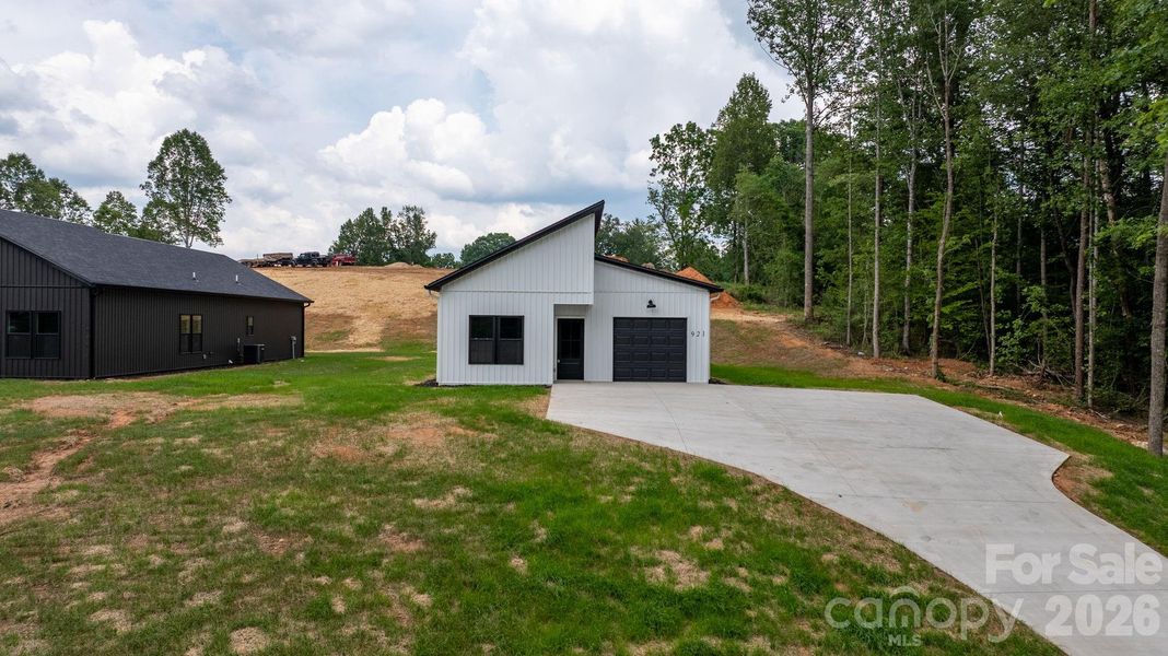 Front exterior of a new home in , Lenoir, NC, highlighting curb appeal (Image 27). Front exterior of a new home in , Lenoir, NC, highlighting curb appeal (Image 27).