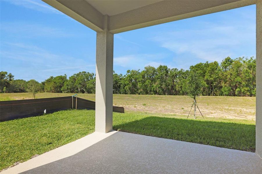 Exterior details and patio area of a home in Seaport Village, Tavares (Image 3).