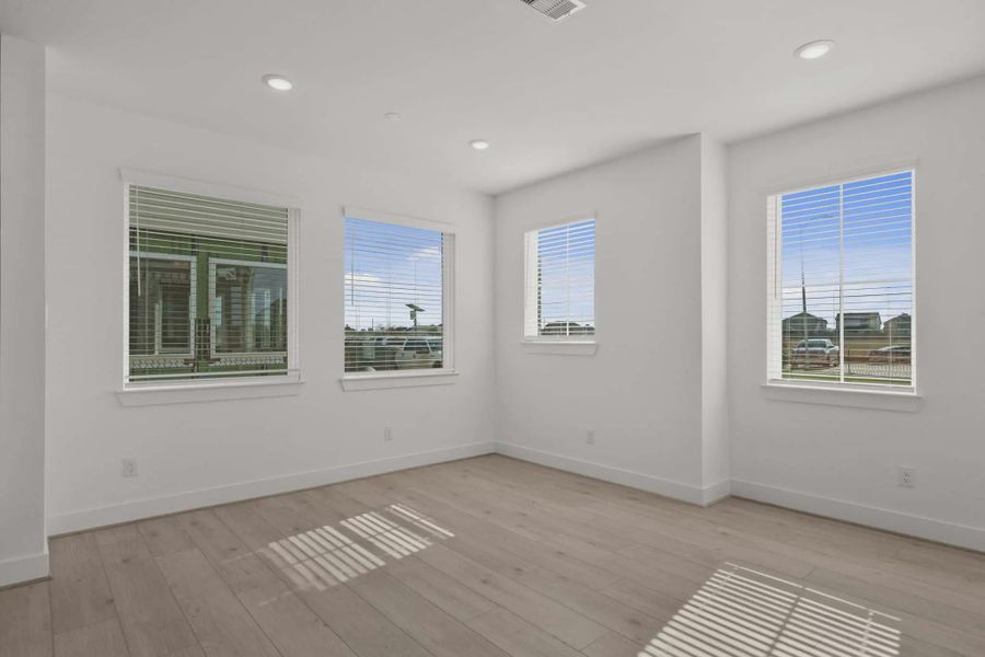 Representative unfurnished interior of a home built from the Riverdale by Chesmar Homes in Meridiana Courtyard Collection, Manvel (Image 21).