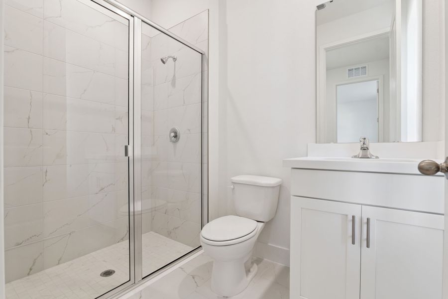 Representative furnished interior of a home built from the Clementine by Hartizen Homes in Eden Crest, Apopka (Image 11).