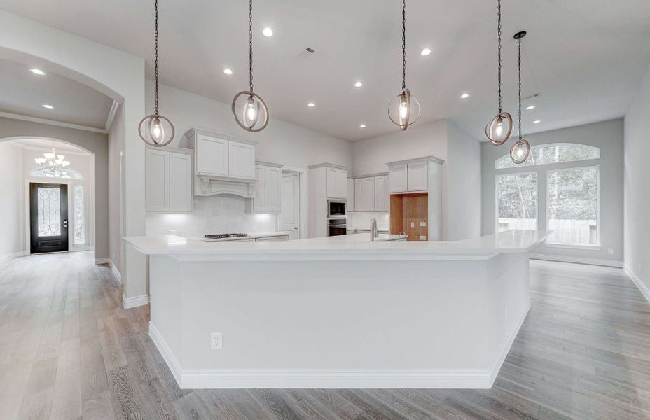 Representative furnished interior of a home built from the 3049 by Ravenna Homes in The Woodlands Hills 65′, Willis (Image 5). Representative furnished interior of a home built from the 3049 by Ravenna Homes in The Woodlands Hills 65′, Willis (Image 5).
