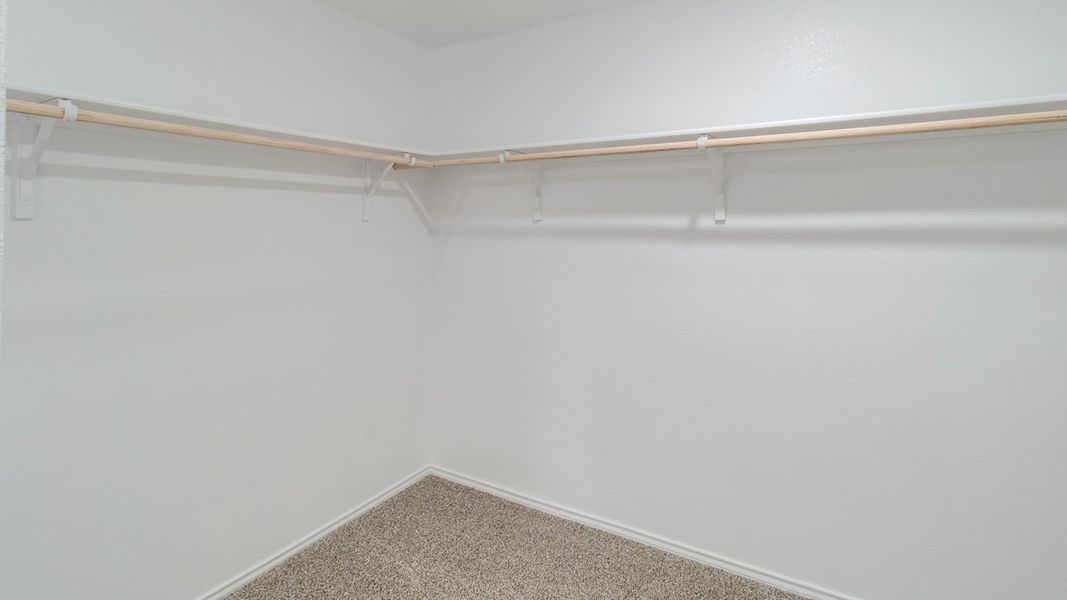 Representative unfurnished interior of a home built from the The Davis by D.R. Horton in Watermill, Uhland (Image 13).