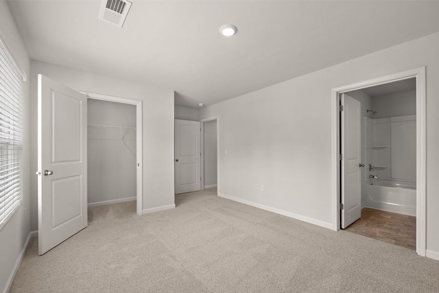 Representative unfurnished interior of a home built from the Mansfield by D.R. Horton in Southwind Village, Evans (Image 40).