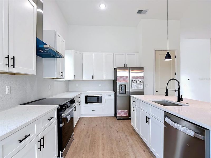 Furnished interior view inside a new home in , Port Charlotte (Image 10).