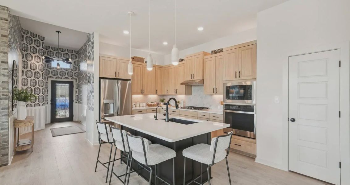 Furnished interior view inside a new home in Stream Waters, Buda (Image 6).