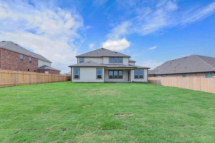 Front exterior of a new home in Salerno - Hallmark Collection, Round Rock, TX, highlighting curb appeal (Image 20). Front exterior of a new home in Salerno - Hallmark Collection, Round Rock, TX, highlighting curb appeal (Image 20).