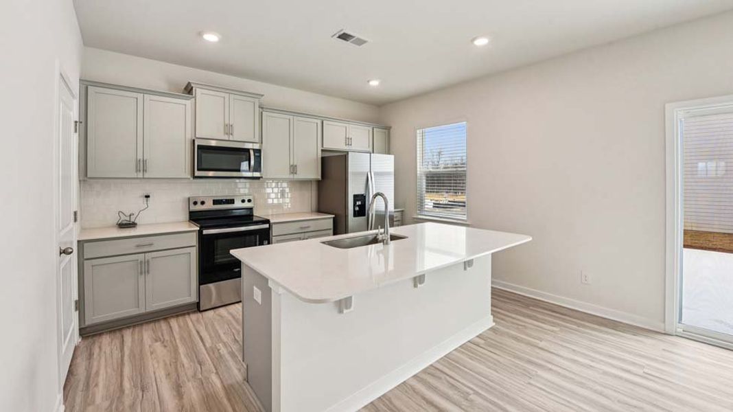Furnished interior view inside a new home in The Falls at Newton, Newton (Image 2). Furnished interior view inside a new home in The Falls at Newton, Newton (Image 2).