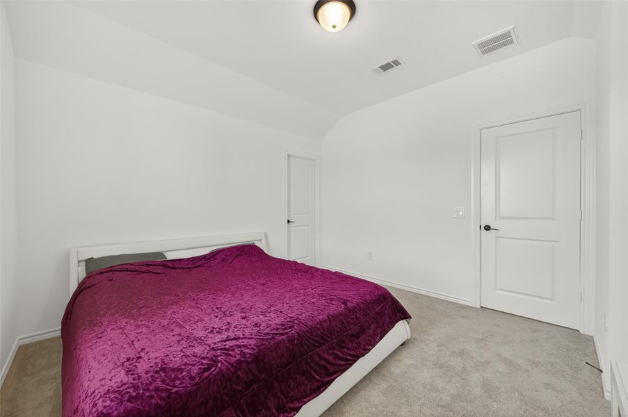 Furnished interior view inside a new home in Sunterra, Katy (Image 32).