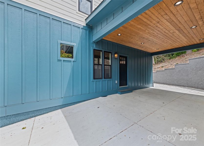 Front exterior of a new home in , Arden, NC, highlighting curb appeal (Image 1).