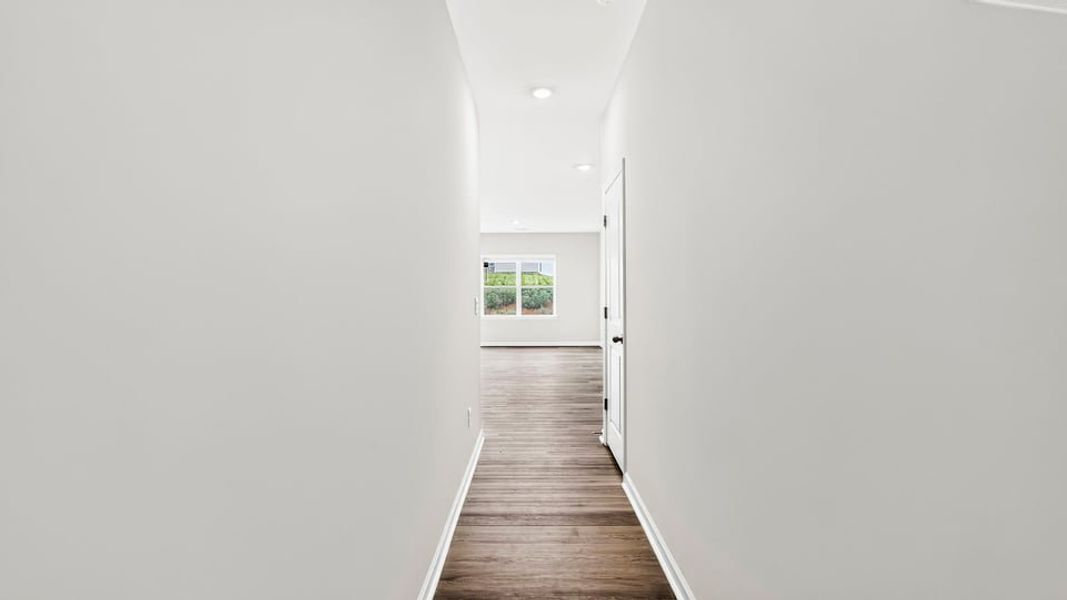 Spacious, unfurnished interior of a new home in Tanglewood Townes, Greenville (Image 19).