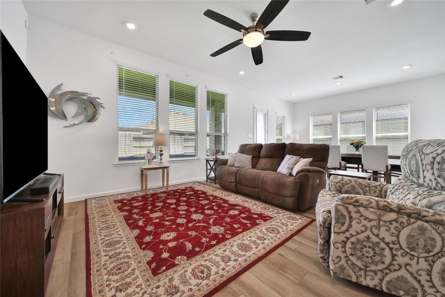 Cozy up in the family room filled with natural light and just a glace away from the kitchen and dining nook