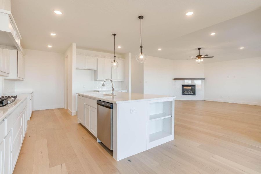 Representative furnished interior of a home built from the Tyler by Graham Hart Home Builder in Sweetgrass, Haslet (Image 5).