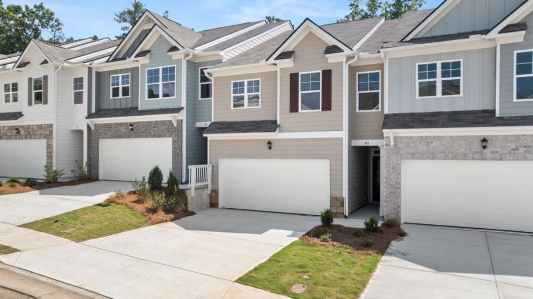 Front exterior of a new home in Mountain Park, Dahlonega, GA, highlighting curb appeal (Image 1). Front exterior of a new home in Mountain Park, Dahlonega, GA, highlighting curb appeal (Image 1).