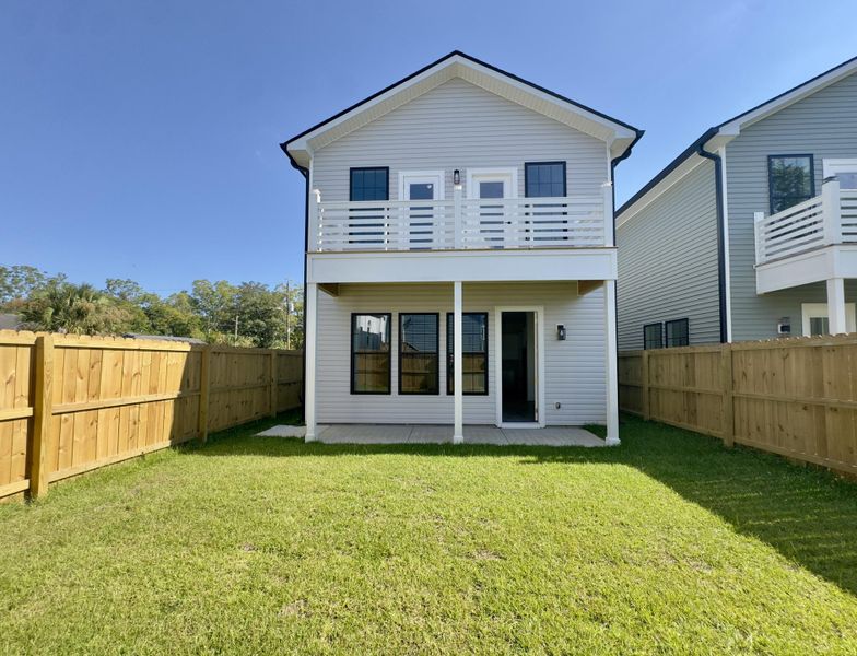 Exterior details and patio area of a home in , North Charleston (Image 1).