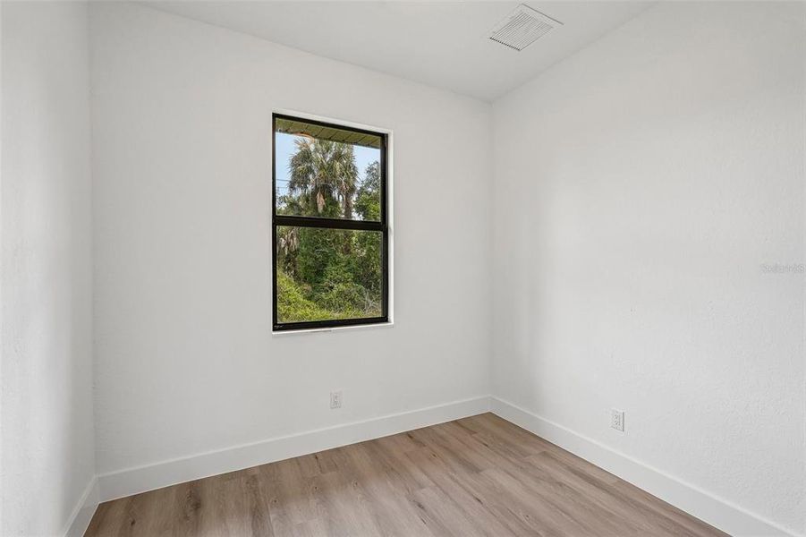Spacious, unfurnished interior of a new home in , Port Charlotte (Image 35).