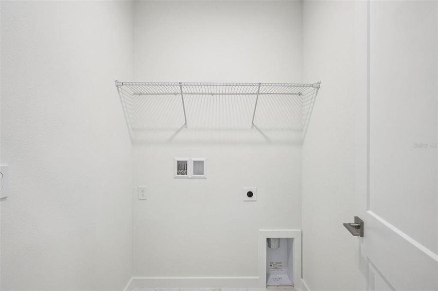 Spacious, unfurnished interior of a new home in Grasslands West, Lakeland (Image 23).