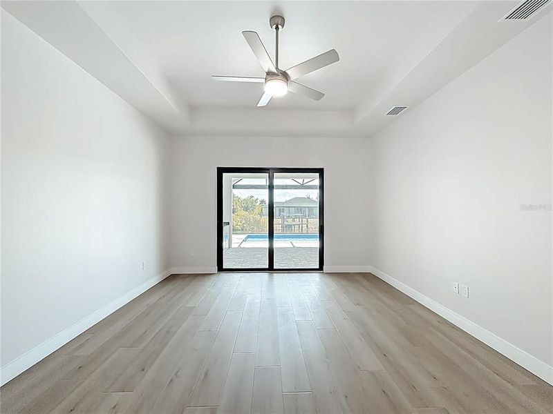 Spacious, unfurnished interior of a new home in , Port Charlotte (Image 57).